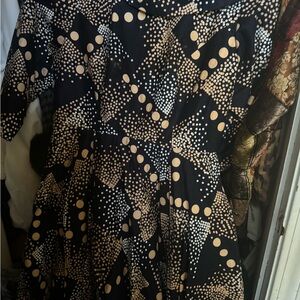 Elegant Black and Cream Geometric Midi Dress